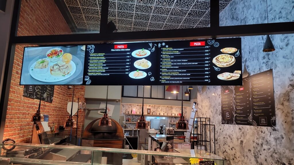 Une solution digitale Digital Menu Board chez Bella Napoli
